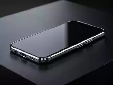 Modernes Smartphone mit Titanrahmen, elegantes Design und Premium-Material auf dunklem Hintergrund. - Foto: über boerse-global.de