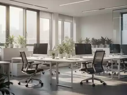 Ein modernes, helles Büro mit ergonomischen Möbeln, Pflanzen und natürlichem Licht, das eine produktive Arbeitsumgebung darstellt. - Foto: über boerse-global.de