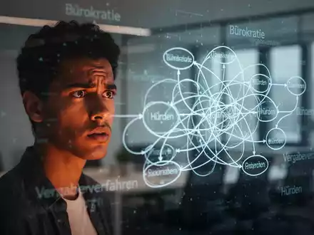 Ein frustrierter junger Unternehmer blickt auf ein komplexes, digitales Flussdiagramm mit deutschen Begriffen wie 'Bürokratie' und 'Hürden'. - Foto: über boerse-global.de