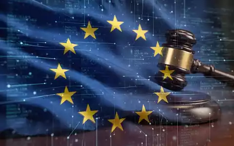 Stilisierte, verschwommene EU-Flagge mit digitalen Datenströmen, die legislative Komplexität und Verzögerung andeuten. - Foto: über boerse-global.de