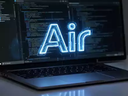 Stilisiertes, leuchtend blaues 'Air'-Logo über einer Laptop-Tastatur, das den Start von JetBrains Air für Windows zur KI-Entwicklung symbolisiert. - Foto: über boerse-global.de