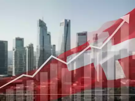 Eine stilisierte Grafik mit Aufwärtstrend und Schweizer Farben, davor eine unscharfe Finanzviertel-Skyline bei Tag. - Foto: über boerse-global.de