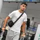 Aleksandar Pavlovic bei seiner Ankunft am Flughafen in München. - Bild: Peter Kneffel/dpa