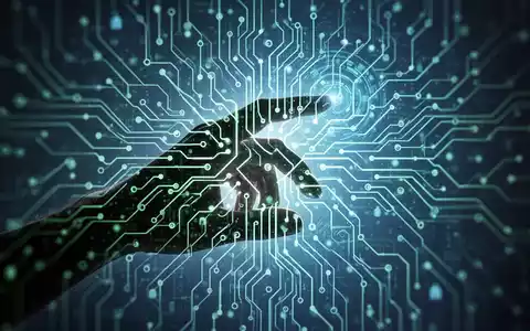 Menschliche Hand-Silhouette interagiert mit leuchtender holografischer Schnittstelle, überlagert mit neuronalem Netzwerk-Muster, symbolisiert KI in der Softwarebereitstellung. - Foto: über boerse-global.de
