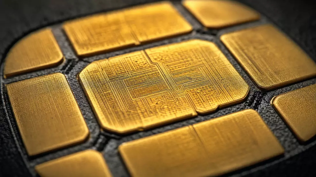 Makro: goldene EMV-Chip-Kontakte einer Bankkarte