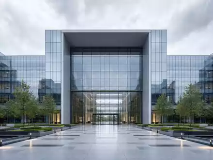Zurich Insurance Group AG CH0011075394 – Gläserne Konzernzentrale mit großem Eingangsportal und geometrisch klarer Fassadenarchitektur - Foto: THN