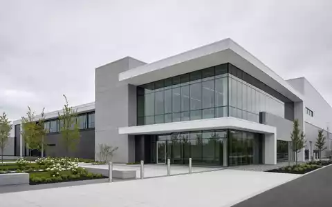 Lonza CH0013841017 modernes Biotech Werk mit Glas Beton Fassade sauber und funktional - Foto: THN