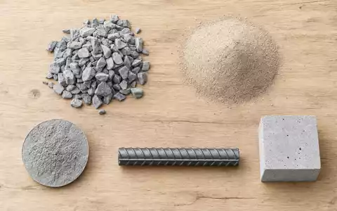 Holcim AG CH0012214059 Baustoff Proben Kies Sand Zementpulver und Bewehrungsstahl auf hellem Holzbrett - Foto: THN