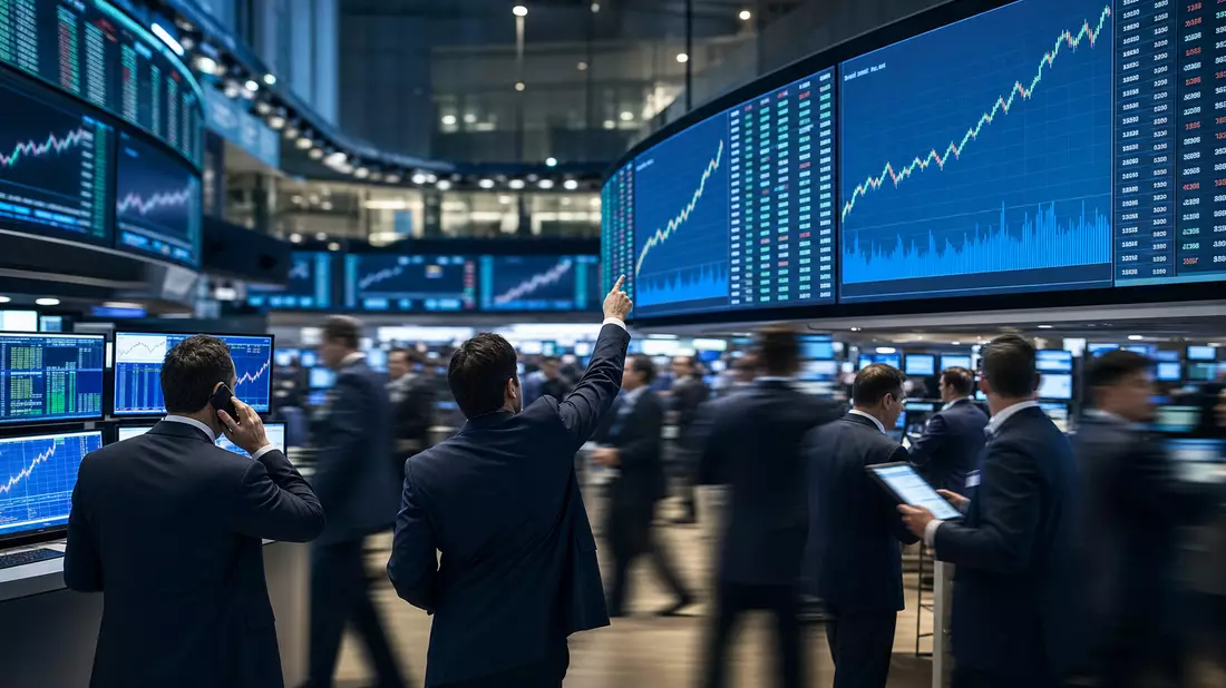 Editorialfoto von Börsenhändlern vor großen Bildschirmen mit Aktiencharts
