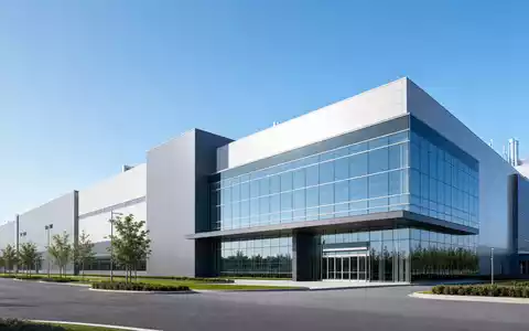Applied Materials Inc. (US0382221051) präsentiert Architektur-Render einer modernen unbeschrifteten Halbleiter-Fertigungsanlage mit Glasfassade - Foto: THN