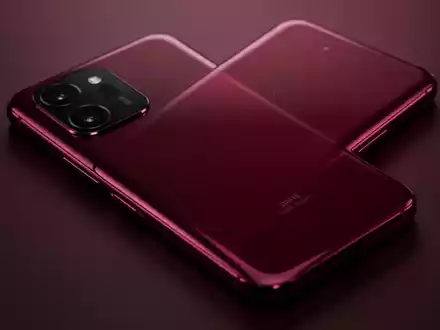 Nahaufnahme eines Smartphones in tiefem Burgunderrot 'Dark Cherry' von oben, mit filmischem Licht. - Foto: über boerse-global.de