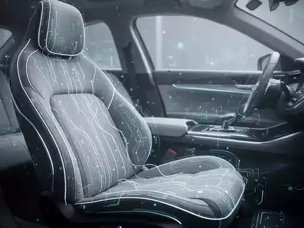 Ein futuristischer Autositz mit leuchtenden Linien, die künstliche Intelligenz und adaptive Technologie symbolisieren, in einer modernen Fahrzeugkabine. - Foto: über boerse-global.de