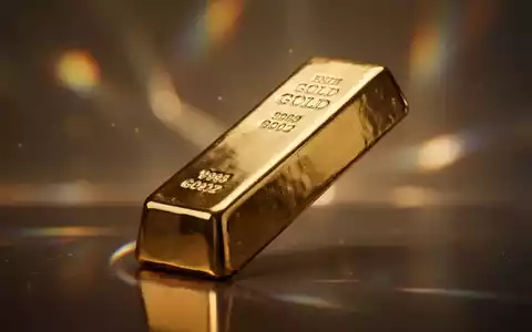 Ein glänzender Goldbarren, der leicht nach oben geneigt ist, mit warmen Lichtreflexionen im Hintergrund. - Foto: über boerse-global.de