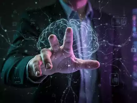 Eine Hand greift nach einer leuchtenden, abstrakten digitalen Schnittstelle mit neuronalen Mustern, die psychologische Manipulation darstellt. - Foto: über boerse-global.de