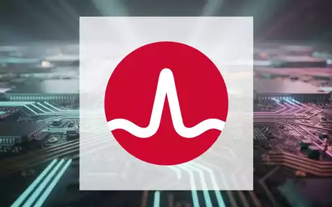 Nahaufnahme einer leuchtenden Leiterplatte mit komplexen Mustern, die Technologie und zukünftiges Wachstum in der KI-Chip-Industrie symbolisieren. - Foto: über boerse-global.de