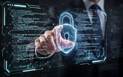 Eine Hand interagiert mit einem holografischen Bildschirm, der leuchtenden Code zeigt, symbolisch für Software-Updates und digitale Sicherheit. - Foto: über boerse-global.de