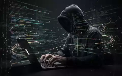 Eine Person im Kapuzenpulli tippt auf einem Laptop, umgeben von verzerrten, leuchtenden Codes und Daten, die KI-Cyberkriminalität symbolisieren. - Foto: über boerse-global.de