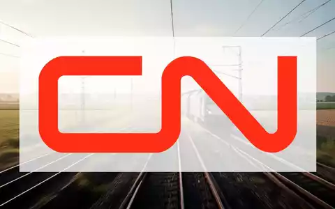 Eine weite, offene Landschaft mit Andeutungen von Bahnschienen und Getreidefeldern, die Transport und Landwirtschaft symbolisiert. - Foto: über boerse-global.de