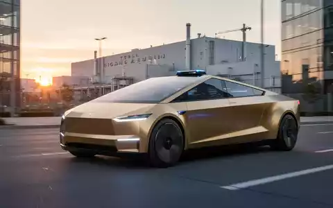 Goldenes Tesla Cybercab Robotaxi auf futuristischer Stadtstraße mit Fabrik im Hintergrund, Symbol für Innovation und Nachhaltigkeit. - Foto: über boerse-global.de
