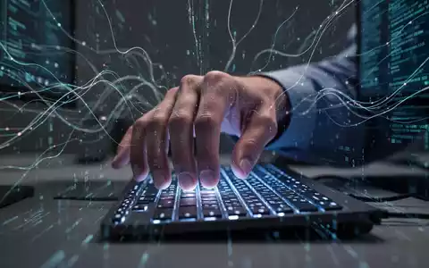 Frustrierte Hand über einer Tastatur, mit abstrakten digitalen Linien im Hintergrund, die KI und Softwarekomplexität darstellen. - Foto: über boerse-global.de