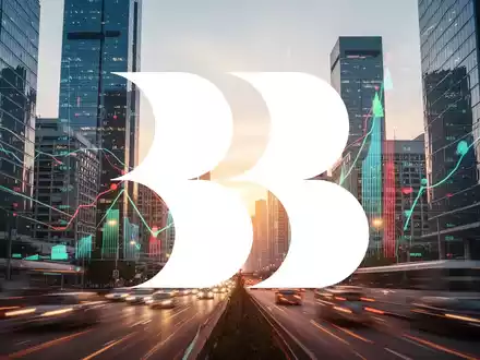 Eine abstrakte, atmosphärische Szene eines modernen Finanzviertels bei Sonnenaufgang, die Optimismus und Wachstum im Investmentsektor darstellt. - Foto: über boerse-global.de