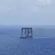 Auf dem Meer wird eine Stufe der neuen Rakete «Langer Marsch 10B» aufgefangen. - Bild: Xing Guangli/XinHua/dpa