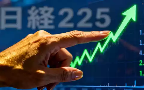 Nahaufnahme einer Hand, die auf eine digitale Börsenanzeige mit einem starken Aufwärtstrend zeigt, im Hintergrund japanische Schriftzeichen. - Foto: über boerse-global.de