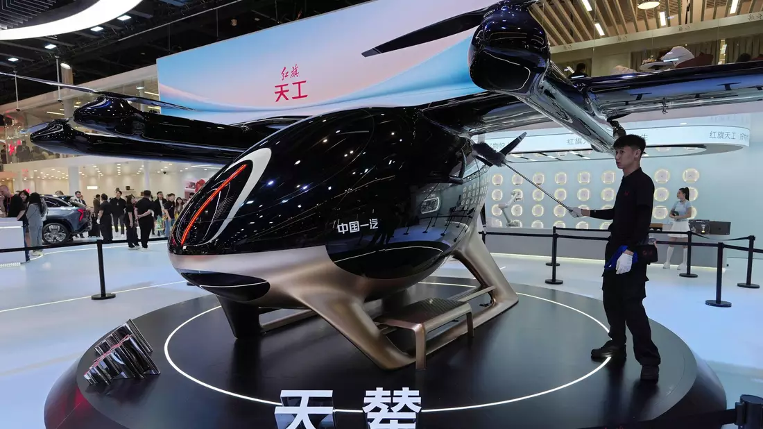 China setzt mit Innovationen der deutschen Autobranche zu - Bild: Ng Han Guan/AP/dpa