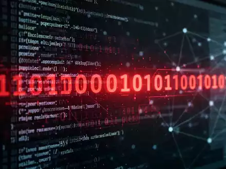 Roter Binärcode auf einem Bildschirm, symbolisiert Cyber-Bedrohung oder Datenleck. - Foto: über boerse-global.de