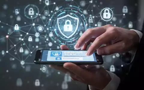 Eine Hand tippt auf ein Smartphone, das eine betrügerische Nachricht anzeigt. Im Hintergrund sind verschwommene digitale Symbole zu sehen. - Foto: über boerse-global.de
