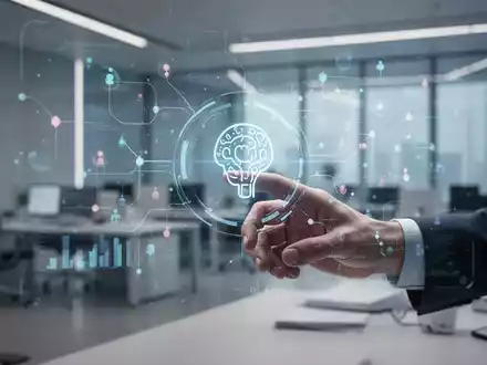 Eine menschliche Hand interagiert mit einer holographischen Schnittstelle, die KI-Symbole und Daten in einem modernen Büroumfeld anzeigt. - Foto: über boerse-global.de