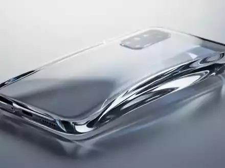 Nahaufnahme, High-Key-Studioaufnahme eines eleganten, futuristischen Smartphone-Prototyps aus einem nahtlosen Stück vierfach gebogenem Glas. - Foto: über boerse-global.de