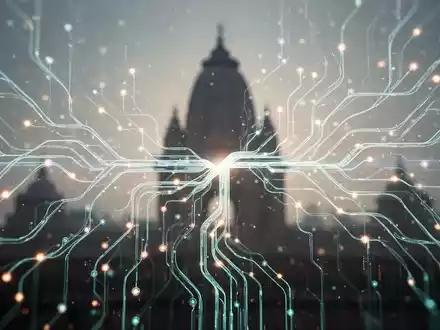 Stilisierte KI-Neuronale Netze leuchten über einem dezenten, verschwommenen Hintergrund mit indischer Architektur, symbolisieren technologisches Wachstum. - Foto: über boerse-global.de