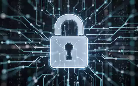 Ein stilisiertes digitales Schloss-Symbol vor einem verschwommenen Hintergrund aus Netzwerklinien und Datenströmen. - Foto: über boerse-global.de