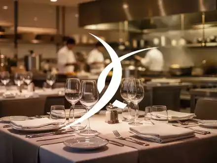 Eine abstrakte, atmosphärische Szene, die den Restaurant- und Gastronomiesektor darstellt, mit einem Gefühl von Wachstum und Stabilität. - Foto: über boerse-global.de