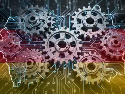 Digitale Darstellung von Zahnrädern und Schaltkreisen mit deutscher Flagge, symbolisiert rechtliche Modernisierung und Digitalisierung. - Foto: über boerse-global.de