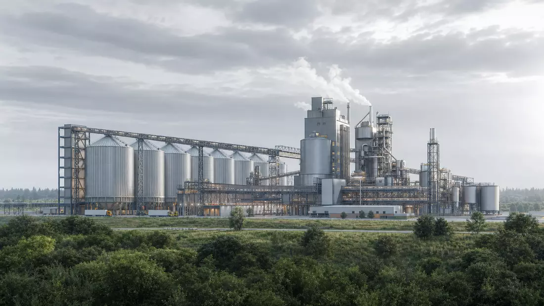 CGI-Render einer modernen Ölsaatenverarbeitungsanlage mit Stahlsilos und Förderbrücken