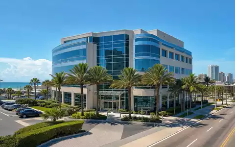 Brown & Brown Inc. Firmensitz in Daytona Beach als fotorealistisches Bürogebäude mit Palmen US1156371007 - Foto: THN