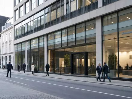 Fotorealistische Bankfiliade zeigt Jyske Bank A/S DK0010307958 in modernem Kopenhagener GeschÀftsviertel bei Tageslicht - Foto: THN