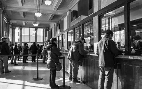M&T Bank Filialalltag als dokumentarische Schwarz Weiss Reportage mit Kunden und Bankangestellten ISIN US55261F1049 - Foto: THN