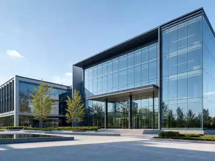 Paycom Software Inc. (US70432V1026) dargestellt als architektonisches Rendering eines modernen Software-Firmensitzes mit Glasfassade und Grünflächen - Foto: THN