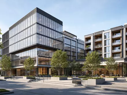 Patrizia SE (DE000PAT1AG3) Architektur-Render eines modernen Büro- und Wohngebäudekomplexes mit Glasfassade und begrüntem Vorplatz - Foto: THN