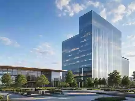 Southern Company US8425871071 illustriert ein modernes Glas-Hochhaus als Architektur-Render mit begrüntem Vorplatz - Foto: THN
