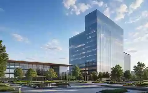 Southern Company US8425871071 illustriert ein modernes Glas-Hochhaus als Architektur-Render mit begrüntem Vorplatz - Foto: THN