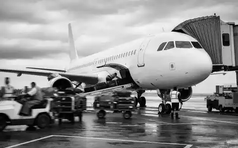 Southwest Airlines Bodenpersonal beim Boarding als dokumentarische Schwarz Weiss Reportage ISIN US8447411088 - Foto: THN