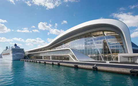 Carnival Corp. futuristisches Kreuzfahrtterminal Render in Miami, modernes Gebäude am Wasser, ISIN US1436583006 - Foto: THN