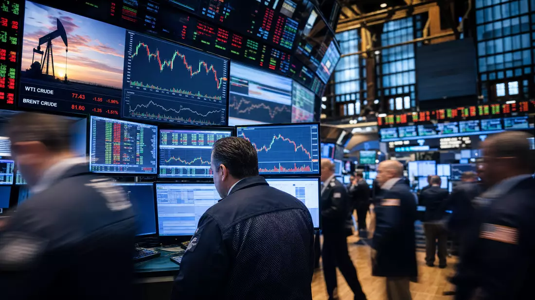 Redaktionsfoto des NYSE-Handelssaals mit Energiesektor-Charts auf mehreren Bildschirmen