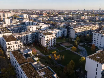 Grand City Properties LU0775917882 zeigt modernes Mehrfamilienhaus-Ensemble aus der Vogelperspektive in deutscher Großstadt - Foto: THN