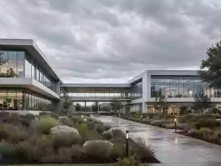 Gilead Sciences Architektur-Render ISIN US3755581036 moderner Pharma-Hauptsitz aus Glas Beton und nativer Bepflanzung - Foto: THN