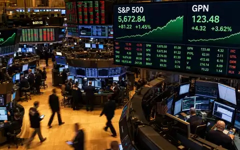 Global Payments US37940X1028 NYSE Trading Floor mit GPN Kurs und S&P 500 Anzeige im Börsenbetrieb - Foto: THN
